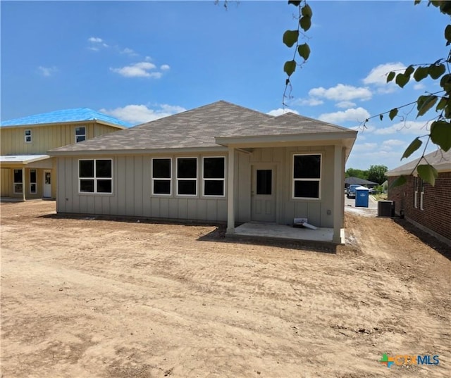 1348 Lindsey Dr, Copperas Cove, TX 76522 - rear view of house featuring board and batten siding, central air condition unit, roof with shingles, and a patio