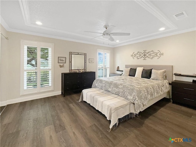 2237 Apache Dr, Harker Heights, TX 76548 - bedroom featuring wood finished floors, crown molding, recessed lighting, a ceiling fan, and a raised ceiling