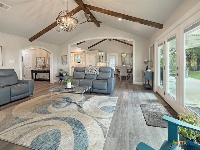 2237 Apache Dr, Harker Heights, TX 76548 - living area featuring arched walkways, wood finished floors, plenty of natural light, and recessed lighting