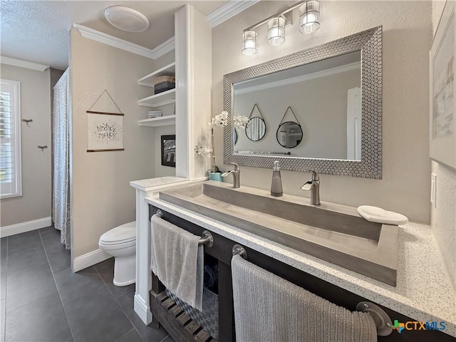 2237 Apache Dr, Harker Heights, TX 76548 - bathroom featuring crown molding, toilet, tile patterned floors, and vanity