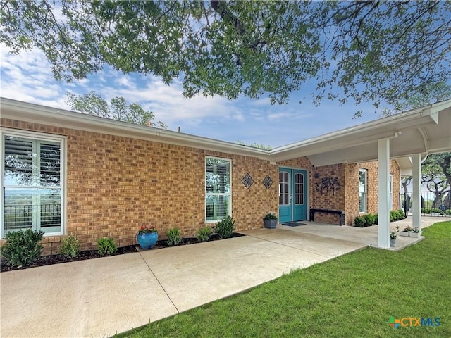 2237 Apache Dr, Harker Heights, TX 76548 - back of property with brick siding and a yard