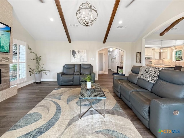 2237 Apache Dr, Harker Heights, TX 76548 - living area featuring arched walkways, a chandelier, healthy amount of natural light, wood finished floors, and recessed lighting