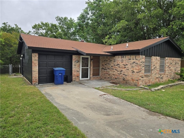 1009 S 29th St, Copperas Cove, TX 76522 - single story home with driveway, brick siding, a garage, and a front yard