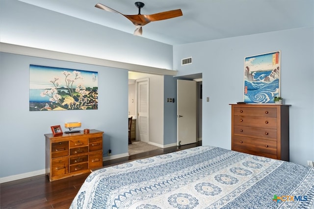 bedroom featuring ceiling fan and dark hardwood / wood-style flooring