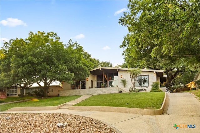 view of front of house with a front yard