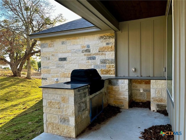 view of patio / terrace with an outdoor kitchen and area for grilling