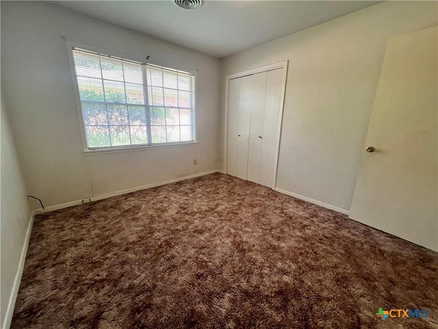 2809 Forest Trl, Temple, TX 76502 - unfurnished bedroom featuring carpet floors, a closet, and baseboards