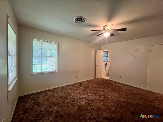 2809 Forest Trl, Temple, TX 76502 - carpeted spare room featuring a ceiling fan and baseboards
