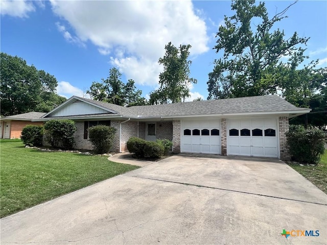 2809 Forest Trl, Temple, TX 76502 - ranch-style house featuring brick siding, a garage, concrete driveway, and a front yard