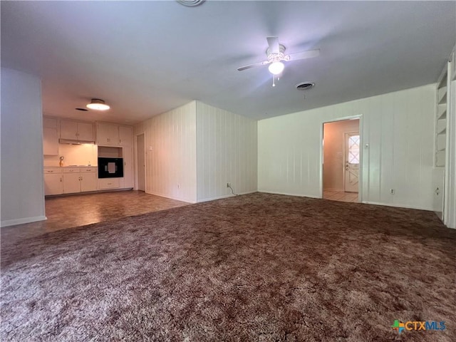 2809 Forest Trl, Temple, TX 76502 - unfurnished living room featuring ceiling fan, carpet, and baseboards