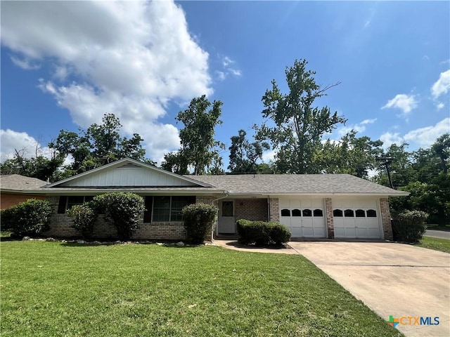 2809 Forest Trl, Temple, TX 76502 - ranch-style house with brick siding, an attached garage, driveway, and a front lawn