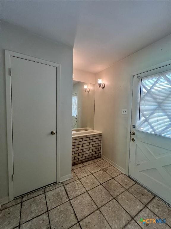2809 Forest Trl, Temple, TX 76502 - entrance foyer with baseboards and light tile patterned floors