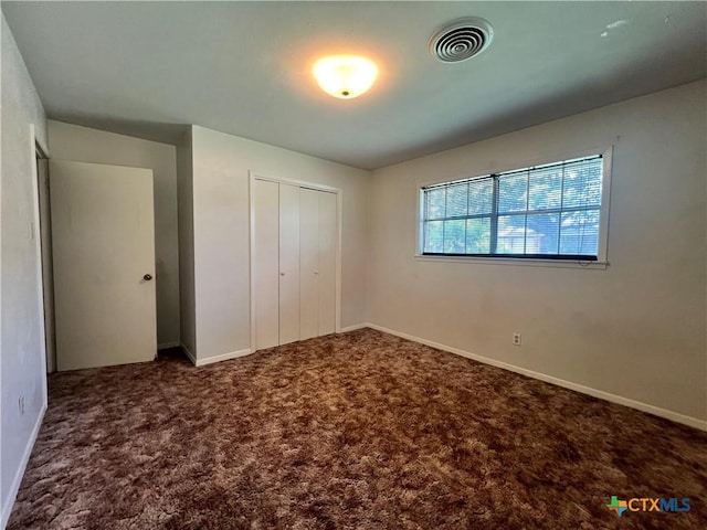 2809 Forest Trl, Temple, TX 76502 - unfurnished bedroom with a closet, carpet floors, and baseboards