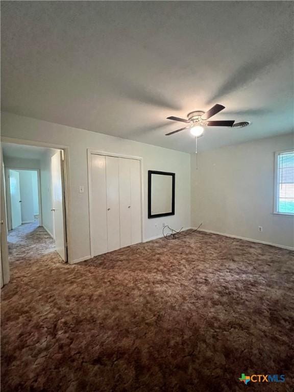 2809 Forest Trl, Temple, TX 76502 - unfurnished bedroom with carpet flooring, baseboards, a ceiling fan, and a closet