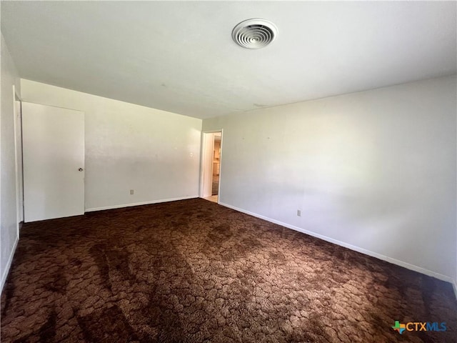 2809 Forest Trl, Temple, TX 76502 - spare room featuring carpet and baseboards