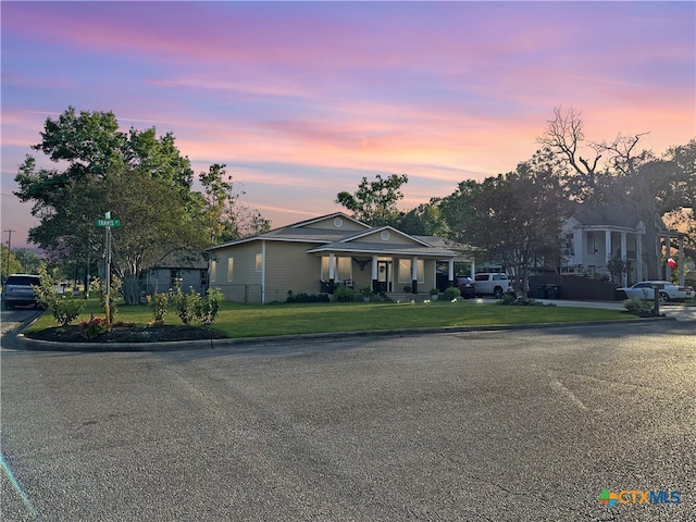 view of front of home featuring a yard