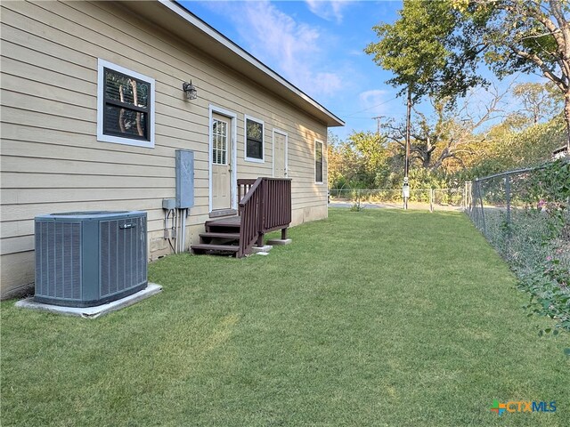 view of yard featuring cooling unit