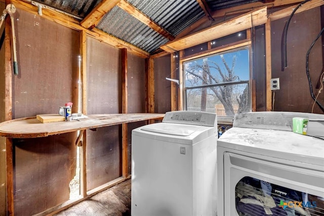 washroom featuring laundry area and washer and clothes dryer