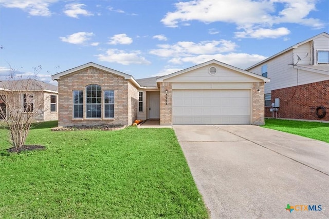 single story home with a front yard and a garage