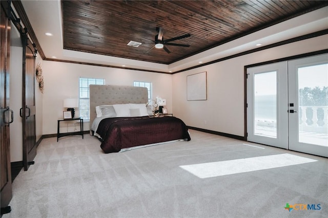 bedroom with access to exterior, light colored carpet, a raised ceiling, and wooden ceiling