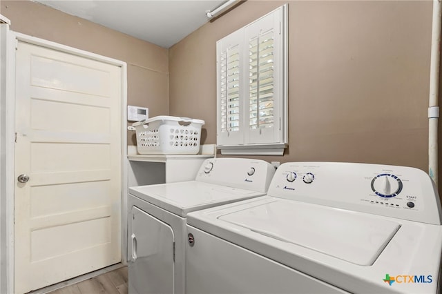 15118 Circle Oak St, San Antonio, TX 78232 - washroom featuring separate washer and dryer and light wood-style floors