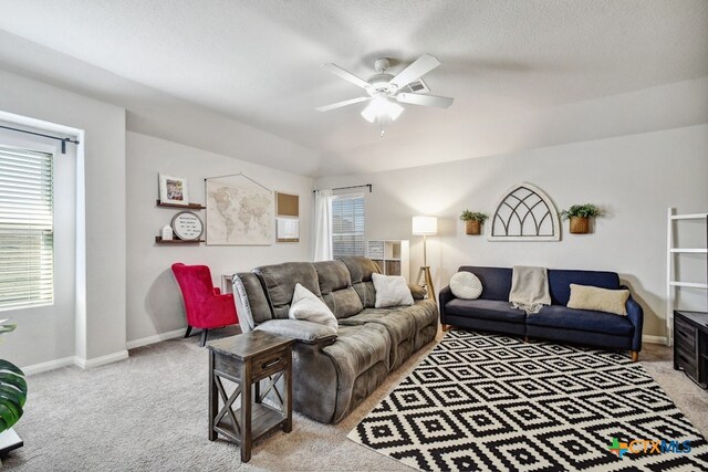 31696 Bard Ln, Bulverde, TX 78163 - carpeted living room with a ceiling fan and baseboards
