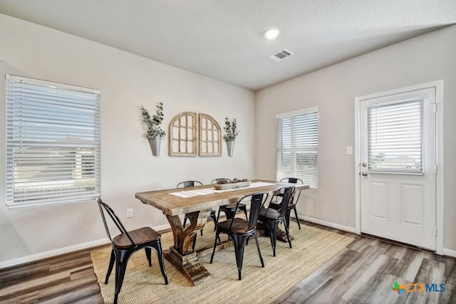 31696 Bard Ln, Bulverde, TX 78163 - dining area featuring wood finished floors and baseboards