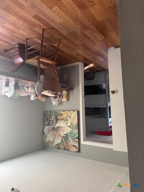 unfurnished bedroom featuring wood ceiling