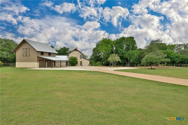 view of yard featuring a garage