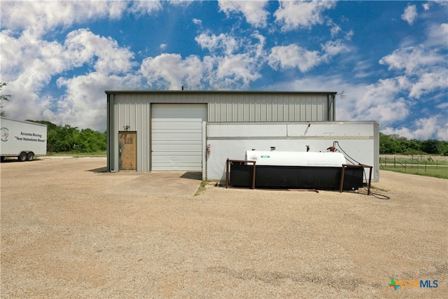 view of outdoor structure with a garage