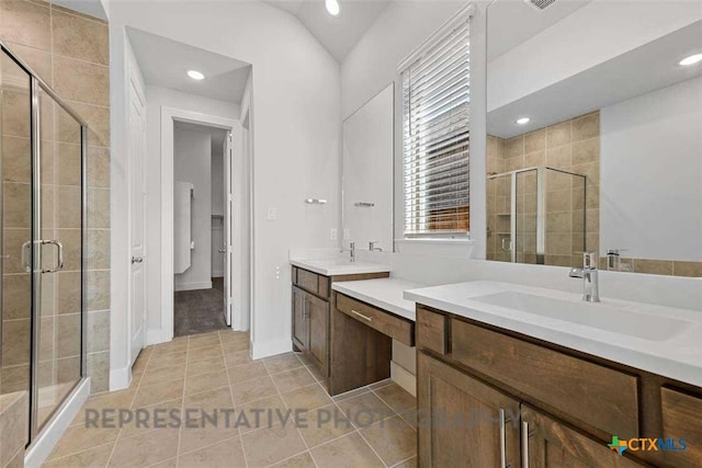 full bathroom with a sink, tile patterned flooring, a stall shower, and recessed lighting