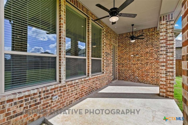 view of patio / terrace featuring ceiling fan