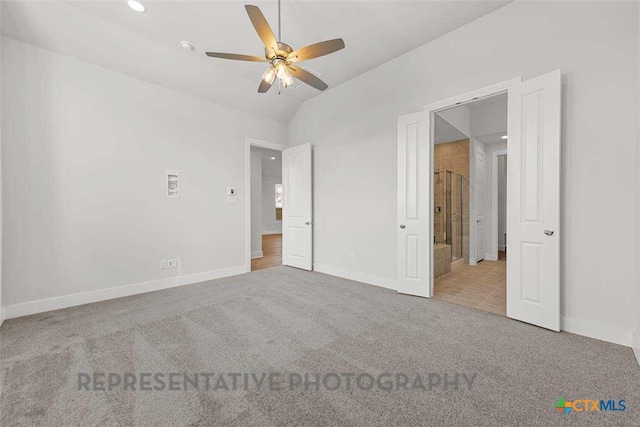 unfurnished bedroom with ceiling fan, carpet, recessed lighting, baseboards, and lofted ceiling