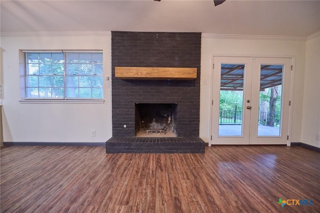 2405 Redwing Dr, Temple, TX 76502 - unfurnished living room featuring wood finished floors, crown molding, french doors, and healthy amount of natural light