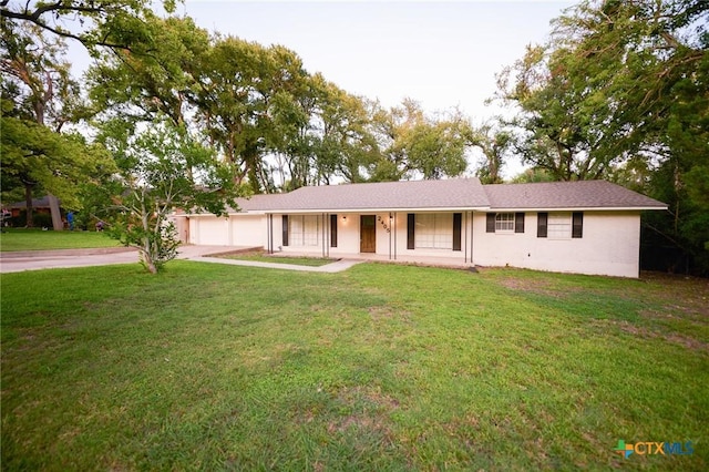2405 Redwing Dr, Temple, TX 76502 - single story home featuring driveway, an attached garage, and a front lawn
