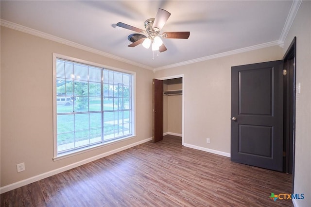 2405 Redwing Dr, Temple, TX 76502 - unfurnished bedroom featuring ornamental molding, wood finished floors, a closet, and a ceiling fan