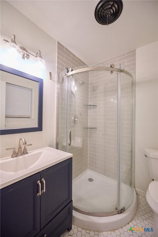 2405 Redwing Dr, Temple, TX 76502 - bathroom with vanity, a shower stall, and tile patterned floors