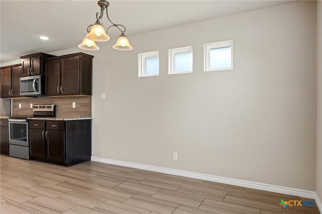 716 Kendra Dr, Temple, TX 76502 - kitchen with appliances with stainless steel finishes, backsplash, dark brown cabinets, hanging light fixtures, and recessed lighting