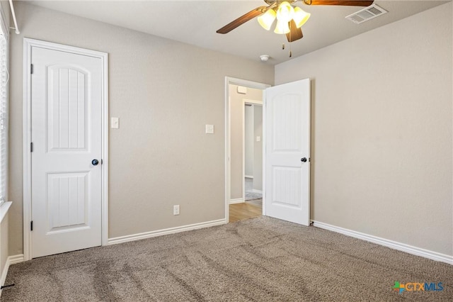 716 Kendra Dr, Temple, TX 76502 - unfurnished bedroom featuring carpet floors and ceiling fan