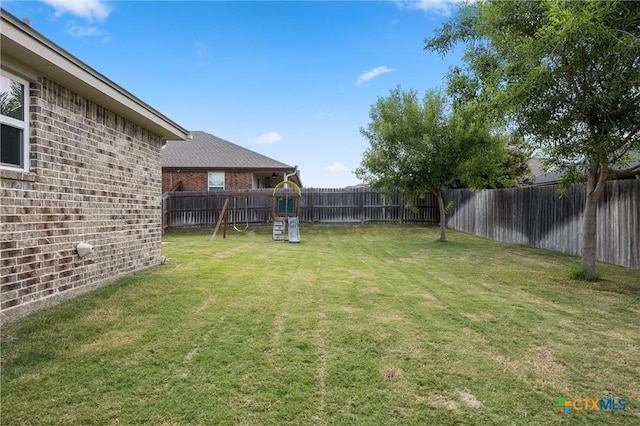 716 Kendra Dr, Temple, TX 76502 - fenced backyard with a playground