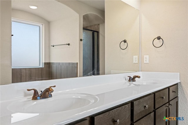 716 Kendra Dr, Temple, TX 76502 - bathroom featuring double vanity and a shower stall