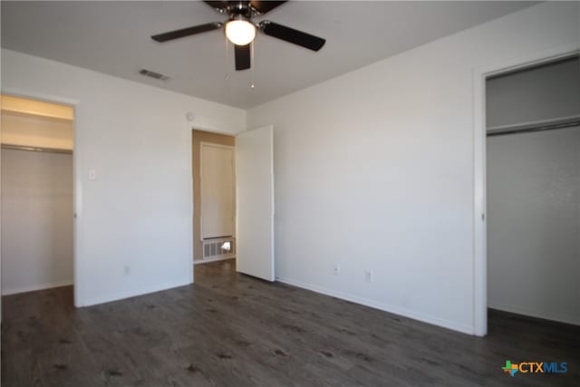 unfurnished bedroom featuring ceiling fan, a closet, and dark hardwood / wood-style floors