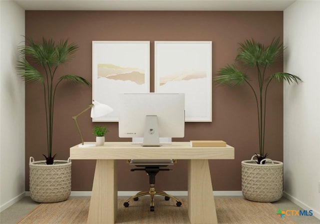 office area featuring baseboards