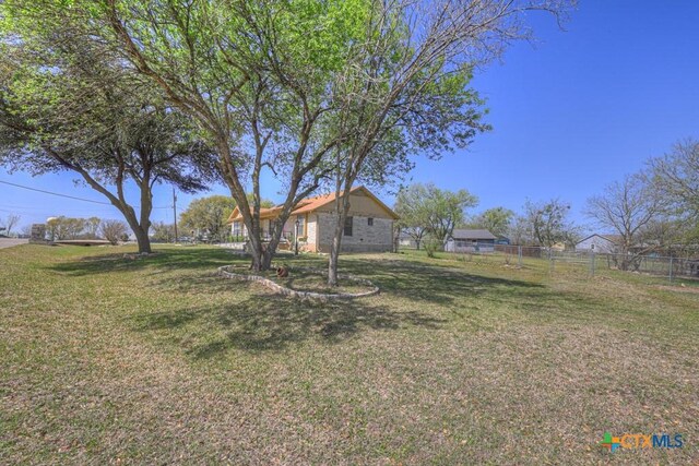 12204 Mustang Dr, Buda, TX 78610 - view of yard featuring fence