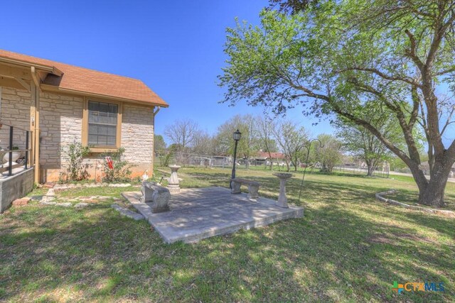 12204 Mustang Dr, Buda, TX 78610 - view of yard with fence and a patio area