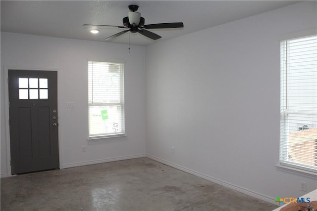 entryway featuring ceiling fan