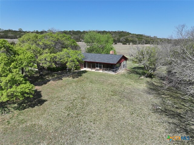 ranch-style house with a front yard