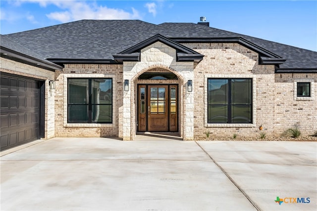 property entrance with a garage