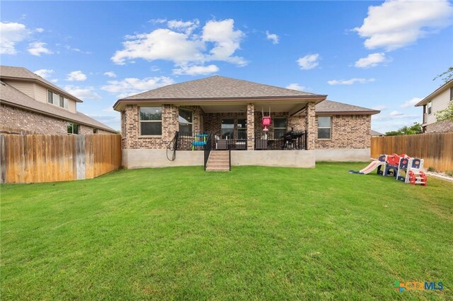 5702 Fenton Ln, Belton, TX 76513 - rear view of house with brick siding