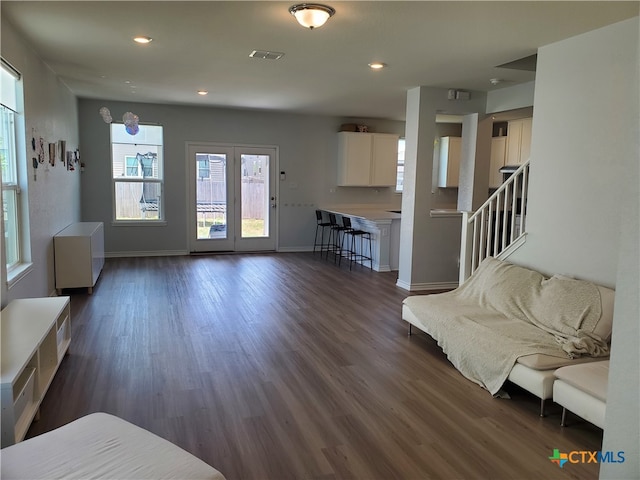 living room featuring dark hardwood / wood-style floors